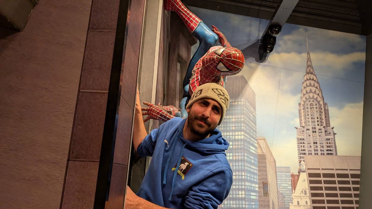 Profile picture of Martin Picollo with Spider-Man statue in the background